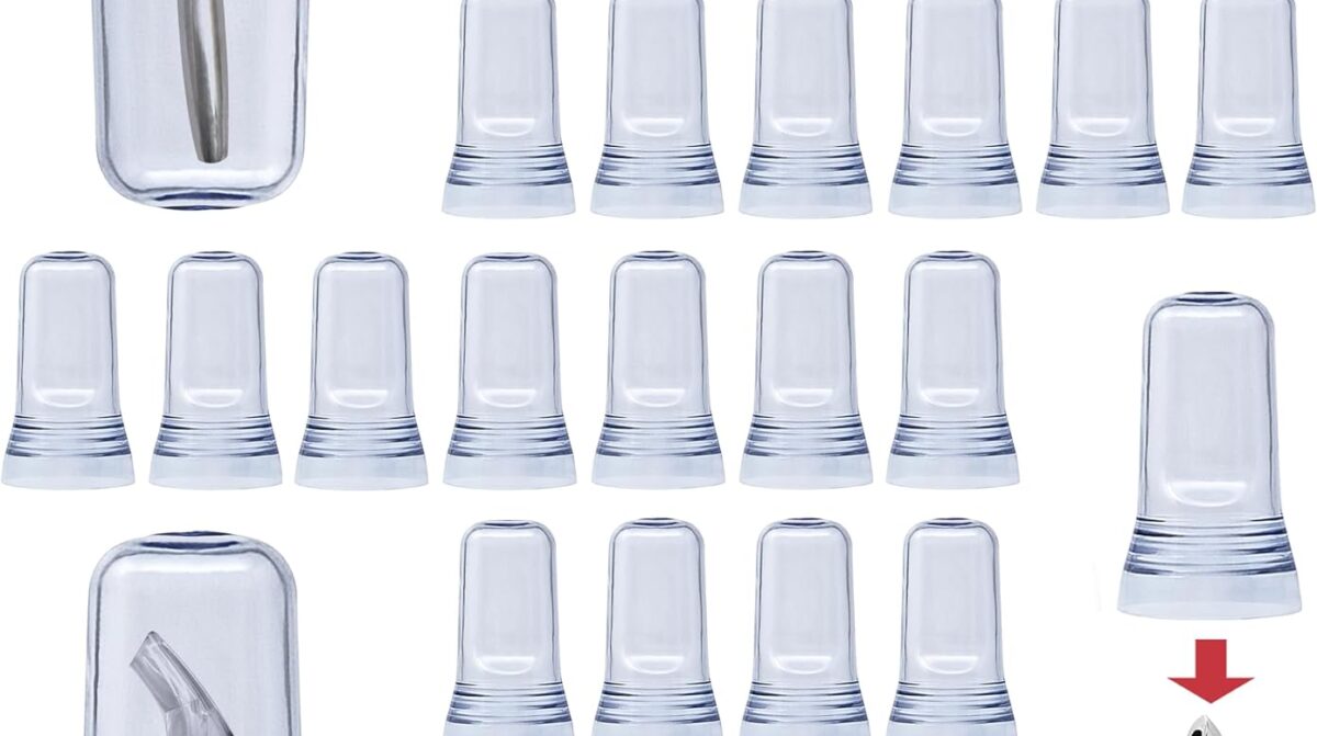 Translucent spout covers and chrome pourers creating a polished bar setup